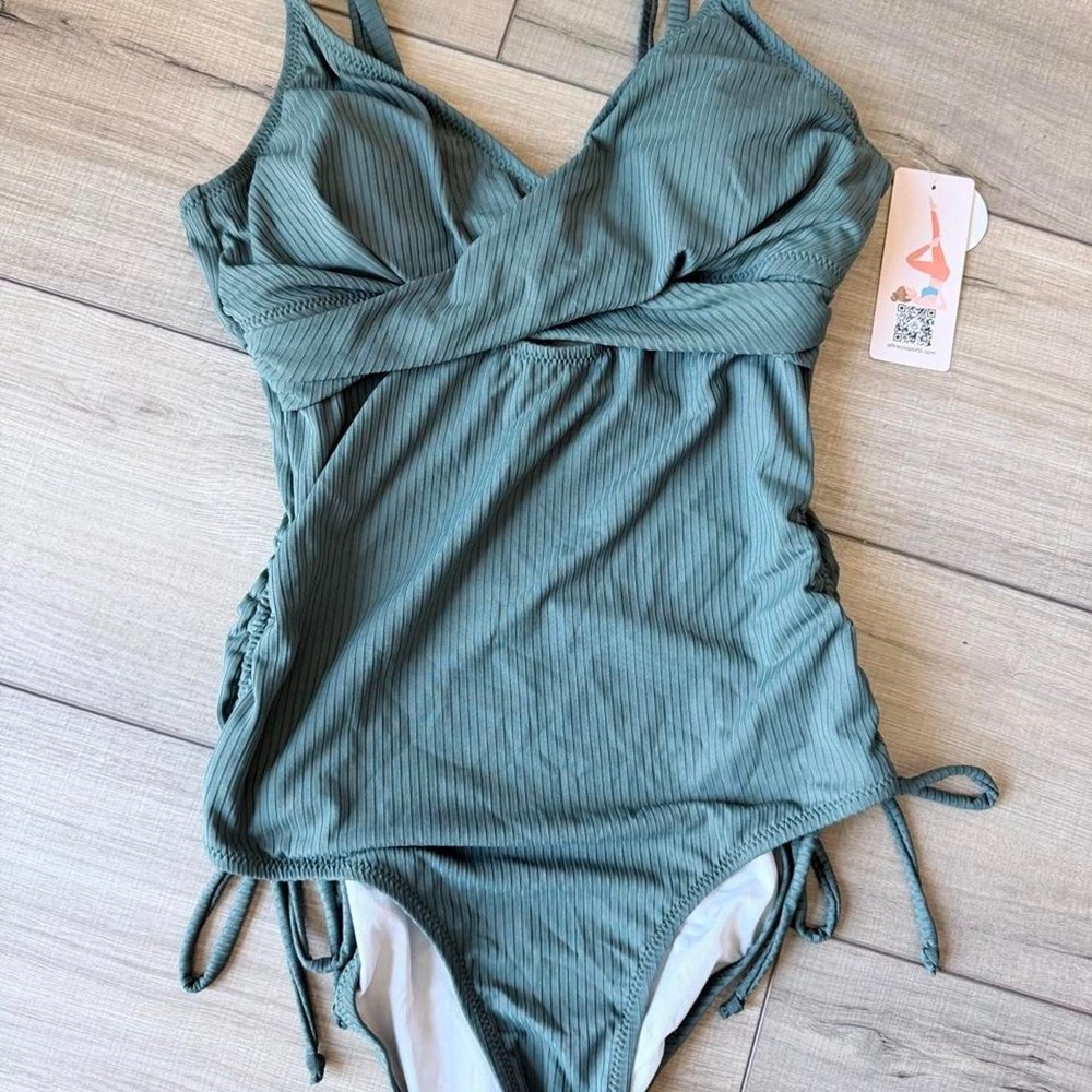 Green ribbed one piece swimsuit with tie sides